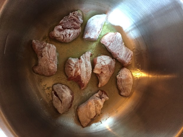 Veal stew with carrots and brandy