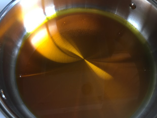 African fish bouillon with red palm oil