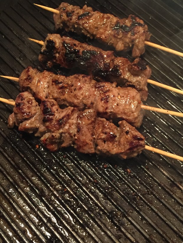 Honey Lamb skewers with grilled vegetables and saffron couscous