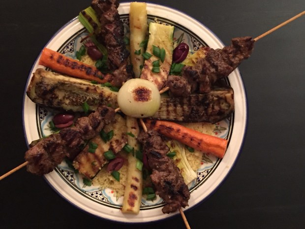 Honey Lamb skewers with grilled vegetables and saffron couscous